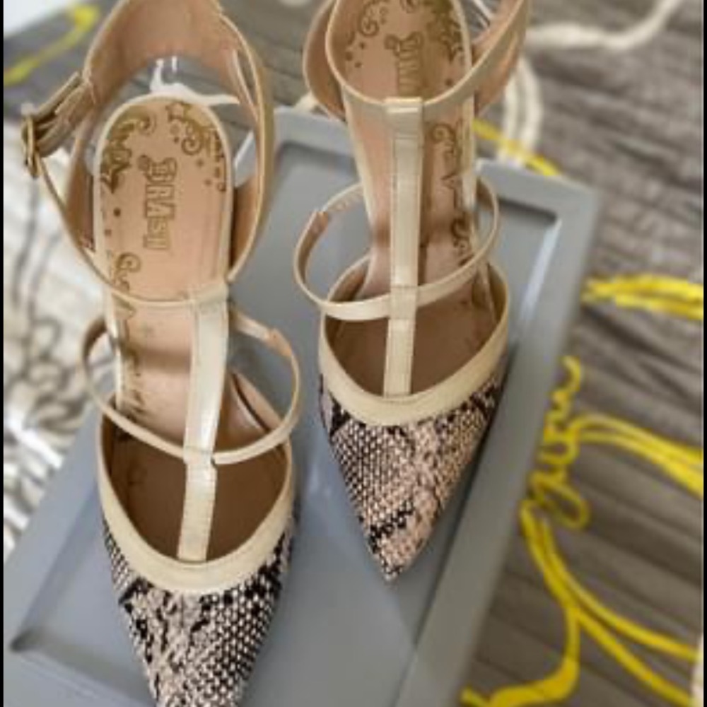 Snake print pumps. Used it once